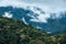 Mountains in tropical rainforest valley landscape with fog at Mo