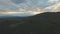 Mountains and a view from the height of the valley at the wonderful summer landscape