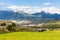 Mountains, villages, churches, pastures covered by white clouds, Qilian Mountains in Qinghai