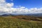 Mountains and White Puffy Clouds