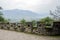 Mountainside ancient brick parapet in cloudy winter afternoon