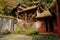 Mountainside Chinese aged buildings in sunlight of winter afternoon