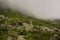 Mountainside covered with clouds.