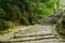 Mountainside stone paved path and steps in winter afternoon