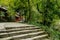 Mountainside stone steps before aged Chinese buildings in winter