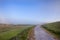 Mountainside Uphill Walking Path On A Foggy Morning