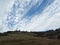 Mountaintops and cloudy sky