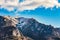 Mountan peaks in the snow on beautiful sunny day. Bright blue sky with large fluffy clouds. Poland, Zakopane