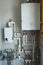 Mounted communications in a built house. Gas boiler, heated floor, counters, sockets, water pump, heating, plastic pipes.
