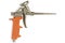 Mounting foam gun with the orange plastic handle isolated on whi