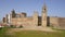 Mourao castle stone walls exterior entrance with church in Alentejo, Portugal