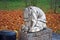 Mournful sculpture on a gravestone. Goritsky Monastery of Dormition in the city of Pereslavl-Zalessky. Russia