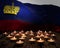 Mourning candles burning on Liechtenstein national flag of background. Memorial weekend, patriot veterans day, National Day of