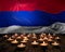 Mourning candles burning on Republic of Srpska national flag background. Memorial weekend, patriot veterans day, National Day of