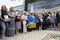 Mourning women mothers and wives standing and holding portraits of sons and husbands in hands. Meeting devoted to the Memorial