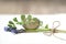 Mouse hyacinth and Easter egg. Small bouquet on a white background. wooden surface. Muscari. spring flowers