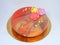 Mouss cake with mirror glass in grenadine color with rainbow rays