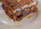 Moussakas, gourmet Greek traditional dish with minced meat, eggplants, potatoes and béchamel, baked in the oven.