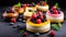 Mousse cake with sponge cake and cream at the black background