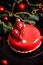 Mousse Christmas pastry cake dessert covered with red mirror glaze with new year decorations