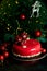 Mousse Christmas pastry cake dessert covered with red mirror glaze with new year decorations
