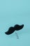 Moustache corkscrew on a blue background