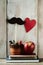 Moustache, heart, pencils, apple and books
