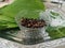 Mouth freshener areca in glass bowl and plate  of Betel leaves kept in a south Indian function