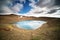 The mouth of a volcano crater filled with water in Iceland. Water Lake in the volcano caldera