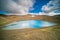 The mouth of a volcano crater filled with water in Iceland. Water Lake in the volcano caldera