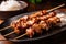 mouth-watering close-up of yakitori skewers with tender chunks of chicken and a tangy teriyaki glaze