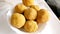 A mouth watering sweet - Besan laddoo made by roasted gram flour, ghee, dry fruits and sugar