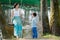 Mouther and cute little boy on swing in playground