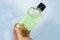 Mouthwash floating in soapy water. Harmful composition of ingredients. Rinse aid with Sodium Lauryl Sulfate. The concept of