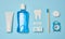 Mouthwash, toothpaste tube, dental floss on a blue background, oral hygiene