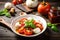 Mouthwatering Caprese salad with ripe tomatoes, fresh mozzarella, and fragrant basil leaves
