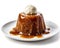 Mouthwatering sticky toffee pudding with cream on a white background, Generative AI