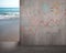 Move doodles concrete wall away with beach view