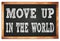 MOVE UP IN THE WORLD words on black wooden frame school blackboard