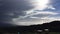 Movement of air masses in the mountains of California. Clouds and cumulus clouds