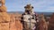 Movement Camera Around Hiker Woman Standing Over The Edge Of The Bryce Canyon