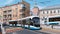 Movement of modern passenger streetcars along Yauza Boulevard against the background of the Church of Peter and Paul