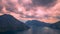 The movement of rain clouds over the mountains in Montenegro at sunset