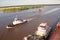 The movement of sea merchant ships and tugs to the entrance and exit from the port. Beaumont, Texas