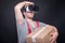 Mover guy holding box wearing vr glasses looking away