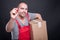 Mover guy holding box writing with red marker