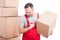 Mover guy holding cardboard box making heart attack gesture