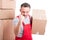 Mover guy holding cardboard box showing fist looking angry