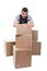 Mover man posing behind cardboard boxes