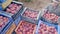 Movers stack boxes of ripe peaches in an orchard